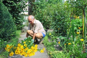 old man with flowers on floor