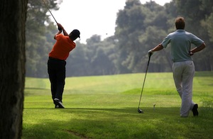 guy playing golf