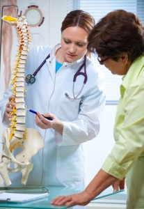 doctor reviewing spine